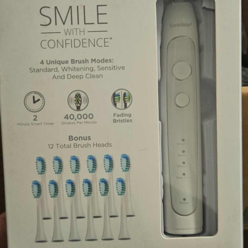 Sonicare Electric Toothbrush with 12 Brush Heads